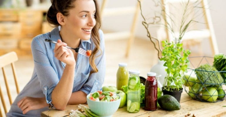 Woman eating healthy | dentist